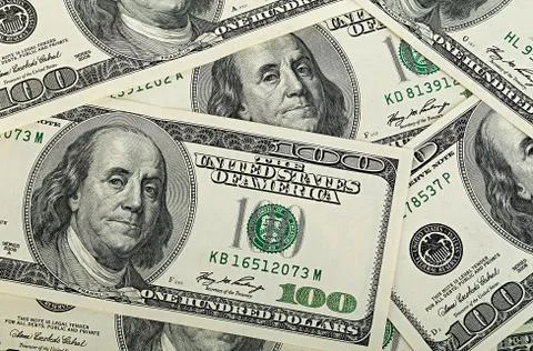 Dollars close-up as a background. Stock Photos
