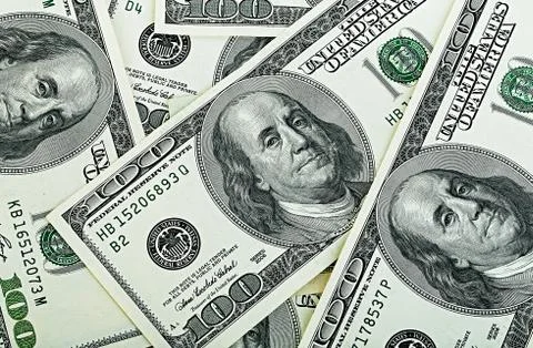 Dollars close-up as a background. Stock Photos