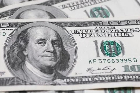 Dollars closeup. Benjamin Franklin's portrait on a  bill. Stock Photos
