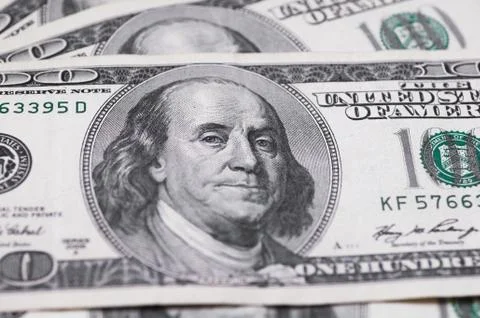 Dollars closeup. Benjamin Franklin's portrait on a  bill. Stock Photos