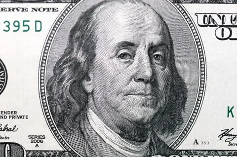 Dollars closeup. Benjamin Franklin's portrait on a  bill. Stock Photos