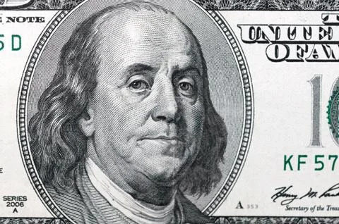 Dollars closeup. Benjamin Franklin's portrait on a  bill. Stock Photos