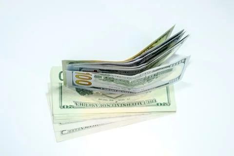 Dollars in a conwind on white background, a lot of money in an envelope. 스톡 사진