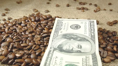 Dollars fall on coffee grains Stock Footage 103097275