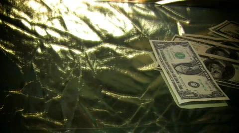 Dollars fluttered off the table Stock Footage