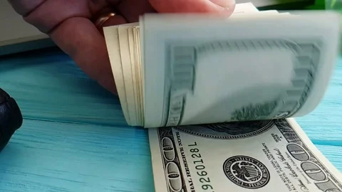 Dollars,  fly, slow-motion, hands count Stock Footage 88140712