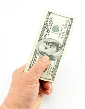 Dollars in a hand Stock Photos