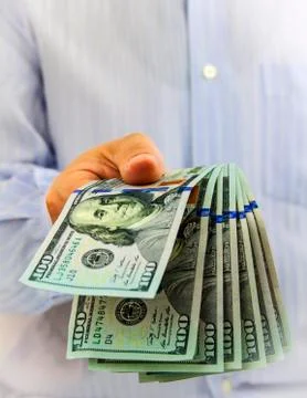 Dollars in hand Foto stock
