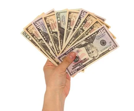 Dollars in hand Stock Photos