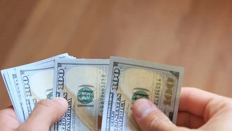 Dollars in hands close up Stock Footage 95008388