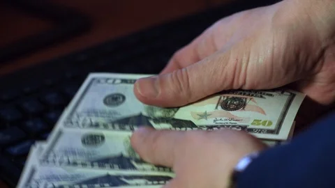 Dollars in the hands Stock Footage 87020672