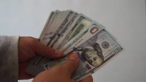 Dollars in hands Stock Footage 134168100