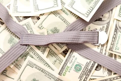 Dollars inside a suitcase background Stock Photos