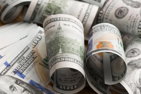 Dollars lie chaotically - Image Stock Photos