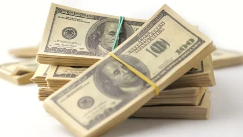 Dollars, money, USD. Stack of US dollars money lies on white background. Close Stock-Footage 257784642