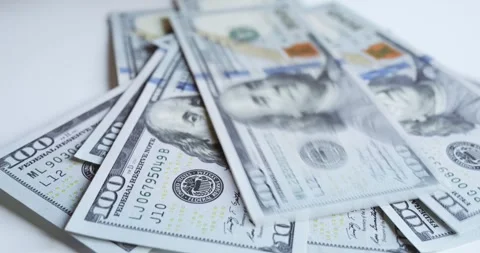 Dollars placed table one by one money counting Each of hundreds of dollars Stock Footage 264009378