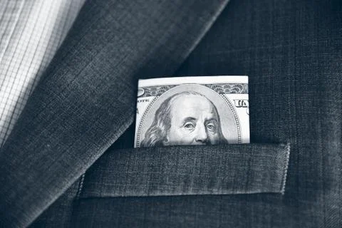 Dollars in the pocket of his jacket (corruption, lobbying, bribery - concep.. Stock Photos