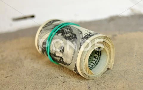 Dollars roll Stock Photos
