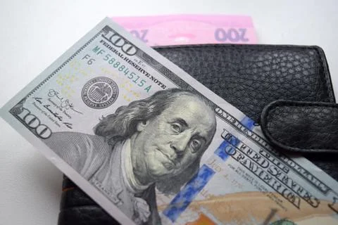 Dollars rolled closeup. Stock Photos