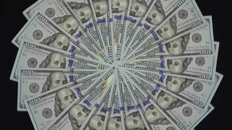 Dollars  spinning in circles Stock Footage 257947842