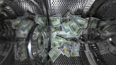 Dollars spinning inside a washing machine Stock Footage 321706165