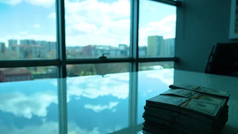 Dollars standing on white table and fast flowing clouds Stock-Footage 270153947