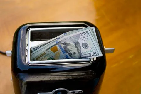 Dollars In Toaster 写真素材