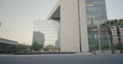Dolly across front of LAPD headquarters in Downtown Los Angeles Stock Footage 276429049