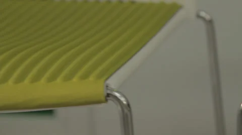 Dolly Along Colored Chairs - Close Up Vídeo Stock 39209264