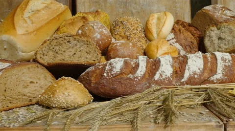 Dolly along large german bakery bread roll bun assortment 스톡 동영상 56517656
