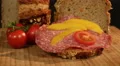 dolly around german spelt bread with salami 4k or 4k+ Resolution