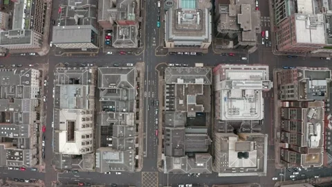 Dolly back top down drone shot over Glasgow grid streets Stock Footage 161469027