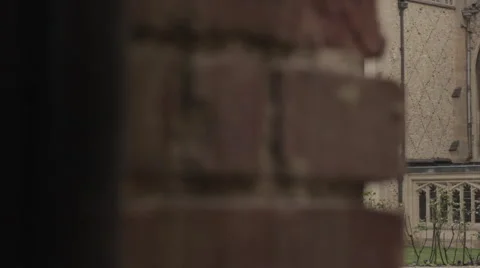 Dolly from brick wall to cathedral Stock Footage 51730609