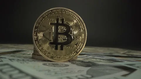 Dolly camera moves from main crypto coin Bitcoin BTC surrounded by hundreds of Video stock 129825513
