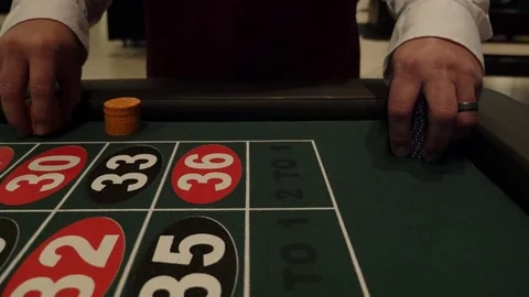 Dolly of chips being placed on a Roulette Table Stock Footage 71115406