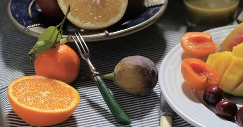 Dolly close up view of an assortment of fresh, healthy, organic fruits Stock Footage 72379656