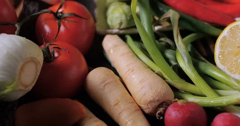 Dolly close up view of an assortment of fresh, healthy, organic vegetables Stock Footage 72381120