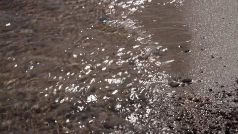 Dolly close up of waves on the shore Video stock 106039428