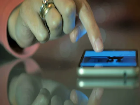 Dolly close-up of a young girl communicates in social networks on smart-phone. Stock Footage 80767539