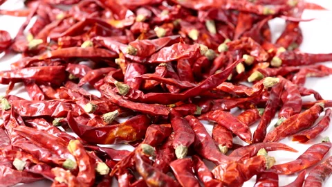 Dolly closeup shot a pile of Dried Red hot chili peppers Stock Footage 310047933