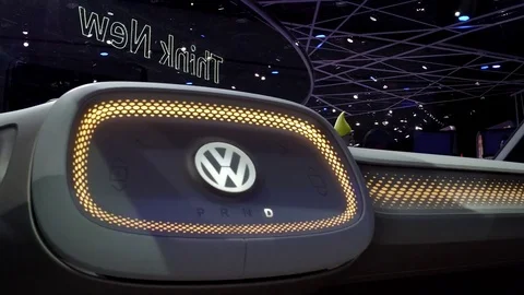Dolly in to cockpit of  VW autonomous self-driving I.D. van at Detroit Auto Show Stock Footage 71592625