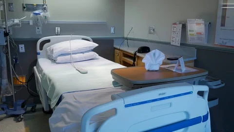 Dolly in on an empty hospital bed Stock Footage 112314534