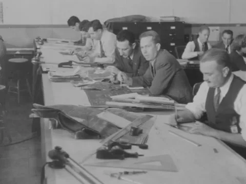 Dolly engineers at desks Video stock 229023689