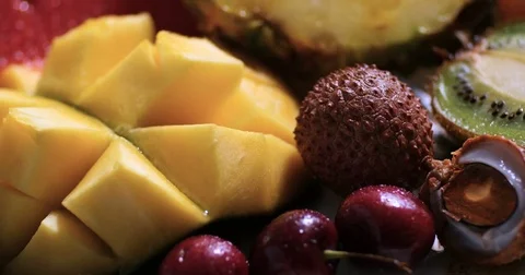 Dolly extreme close up view of an assortment of fresh, healthy, organic fruits Stock Footage 71857600