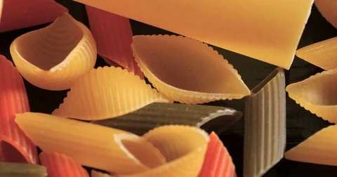 Dolly extreme close up view of different variety of Italian pasta Stock Footage 71357284