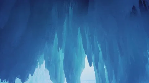 Dolly  fabulous ice cave sharp icicles frost stalactites grotto frozen winter 4k Stock Footage 155668045