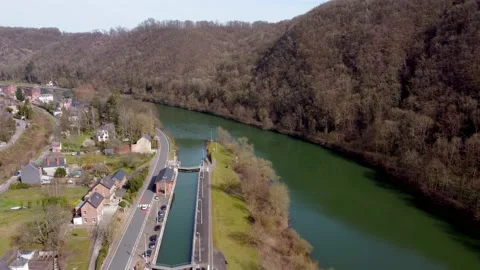 Dolly In: Fly over river Meuse (Belgium) Stock Footage 202210576