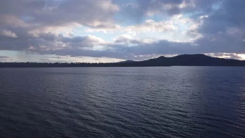 Dolly in - flying above the lake surface Stock Footage 158547535
