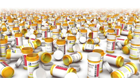 Dolly forward over many Empty Pill Bottles to none Stock Footage 39884844