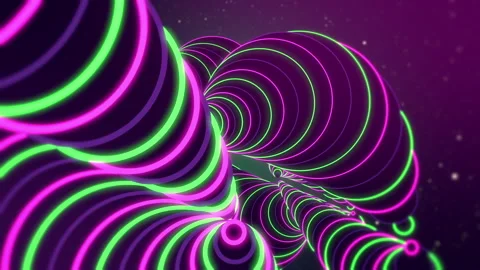 Dolly in getting inside a spiral formed with neon green and violet circles. 動画素材 145384912